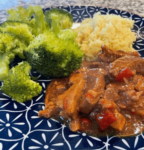 Plates teriyaki beef and broccoli with rice